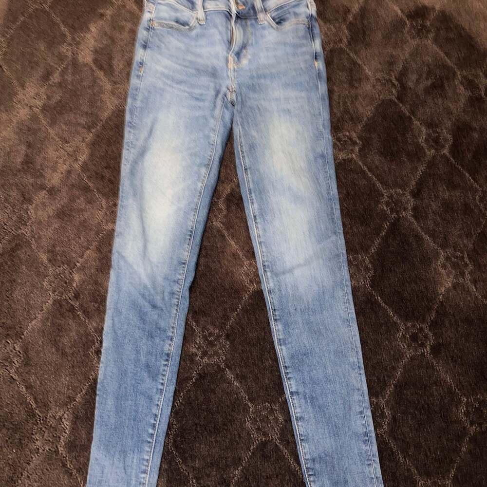 American Eagle Next Level Stretch Jean jeaggins Size 000 Regular Blue Women's